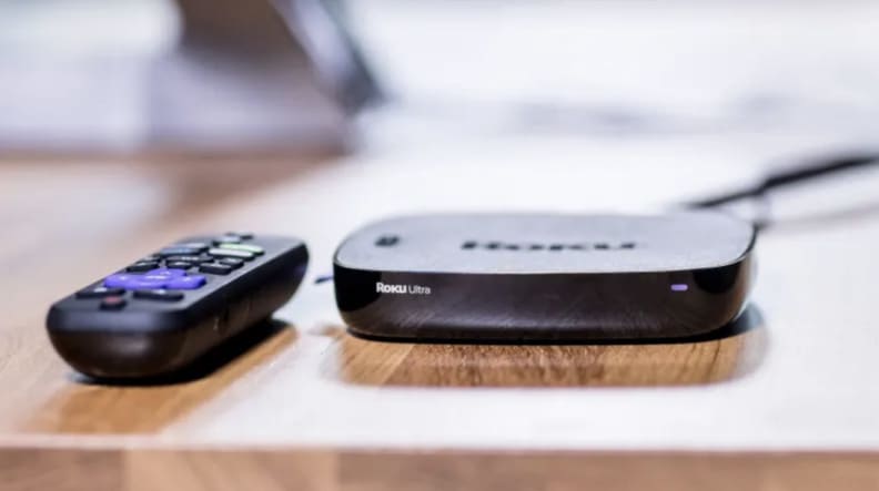 Close up of a Roku on a table.