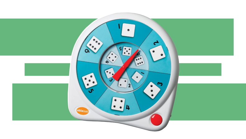 The teal and white Ablenet All-Turn-It Spinner hovering over a green and white background.