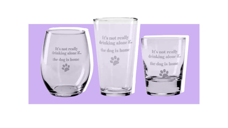 A wine glass, a beer glass, and a liquor glass with the text 