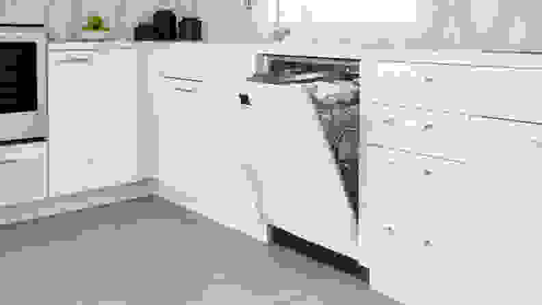 A Bosch 100 dishwasher shown slightly open in a kitchen.