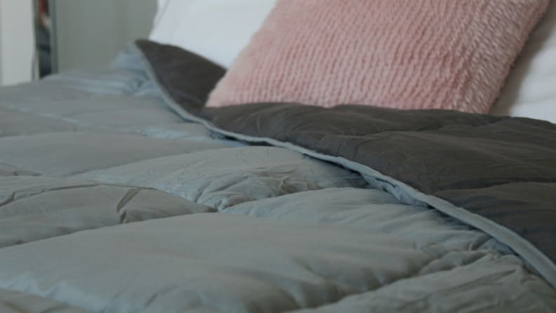 Bedspread on mattress.