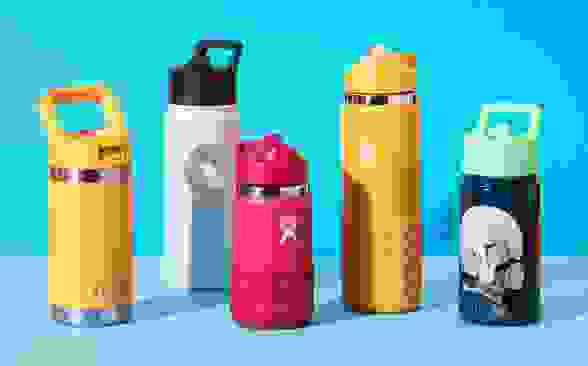 A few of the best water bottles for kids on a blue background.