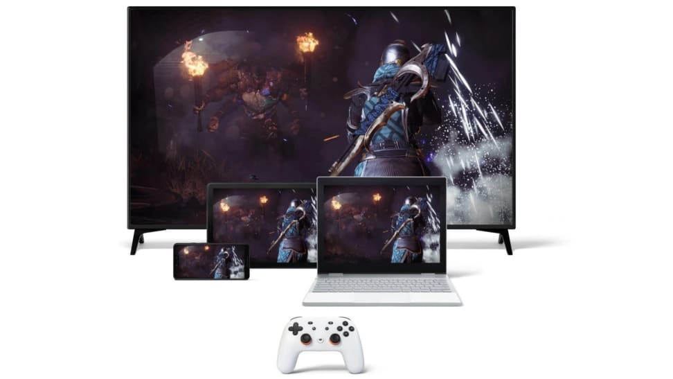 A Google Stadia set up with access to television, laptop, mobile phone, and smartpad.