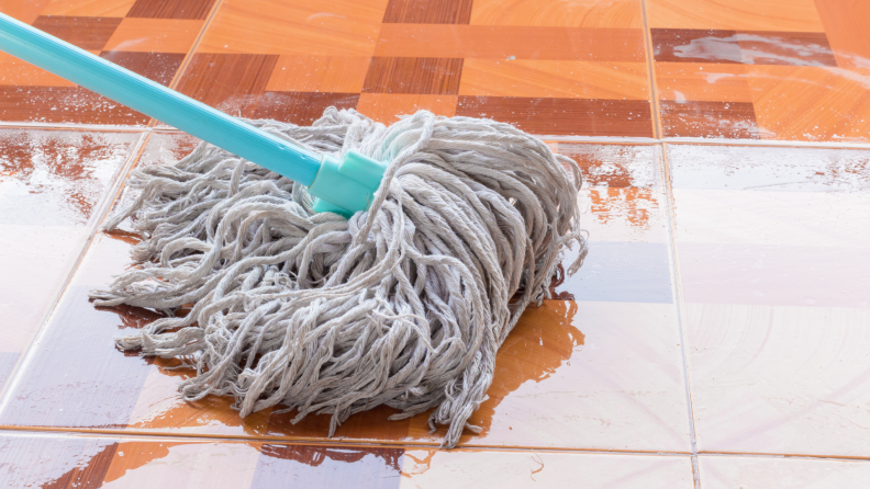 Large mop on wet tile