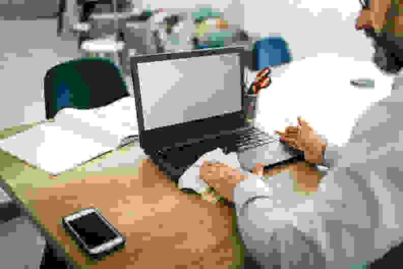 A laptop being cleaned