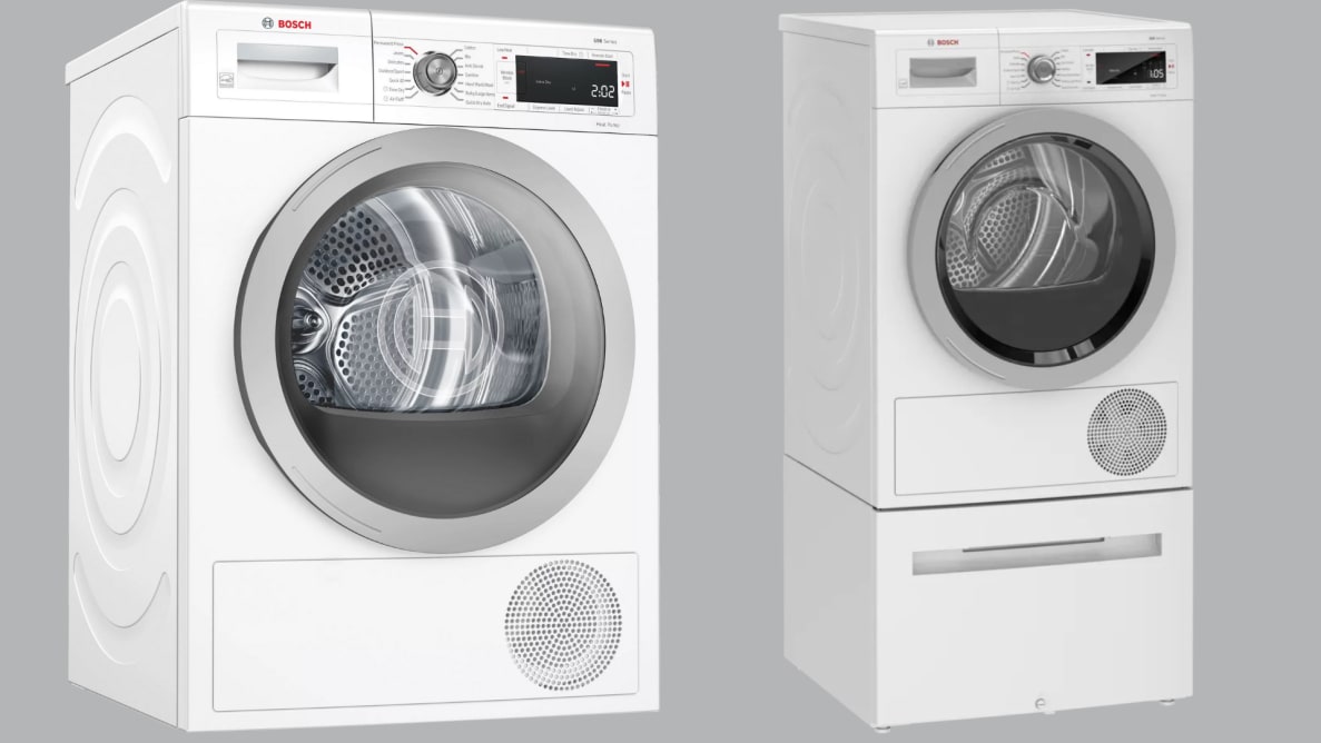 Matching washer and dryer set from Bosch in front of gray background.