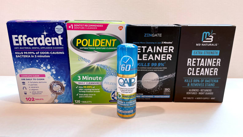 A collection of five popular dental appliance cleaning solutions