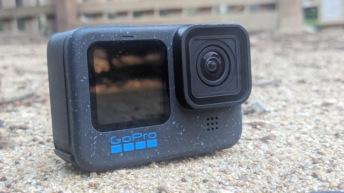 The GoPro Hero12 Black laying on the ground in an outdoor setting.