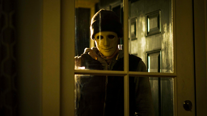 A masked killer torments a fiction writer in Netflix’s ‘Hush.’