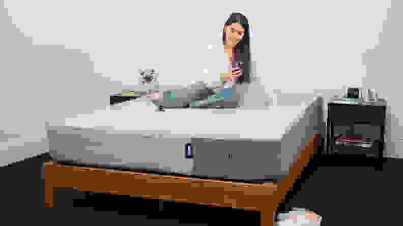 Woman on a casper mattress