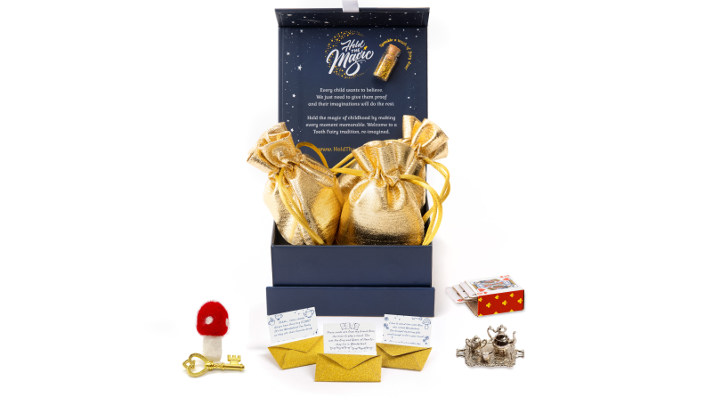 A box with three gold pouches, tiny tea set, and felt mushroom