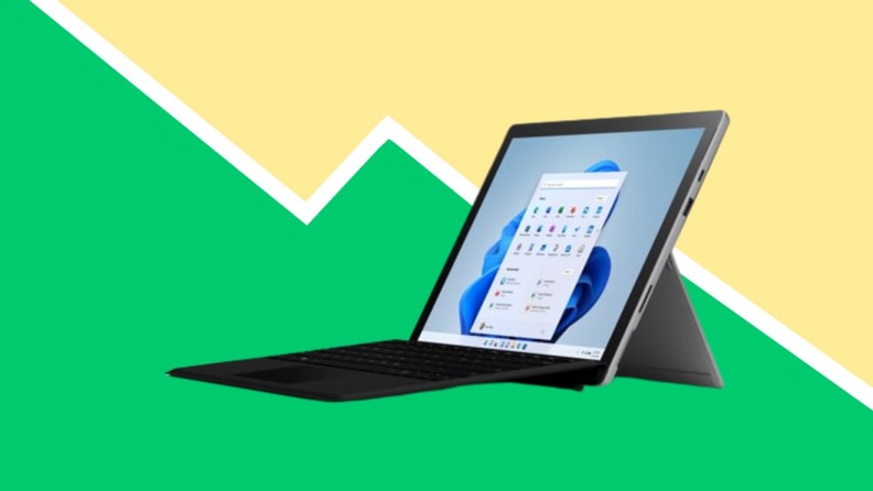 Tablet on yellow and green background