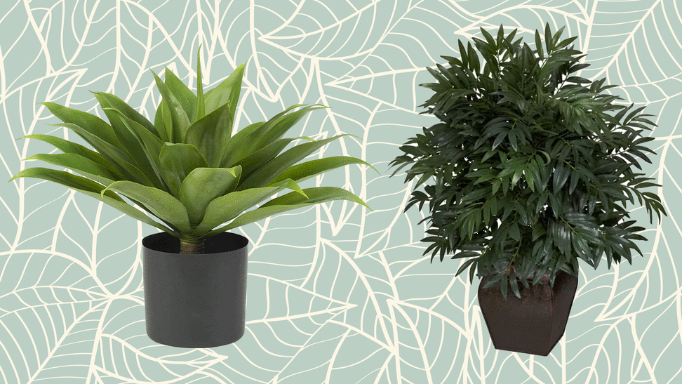 Two fake plants on leafy background