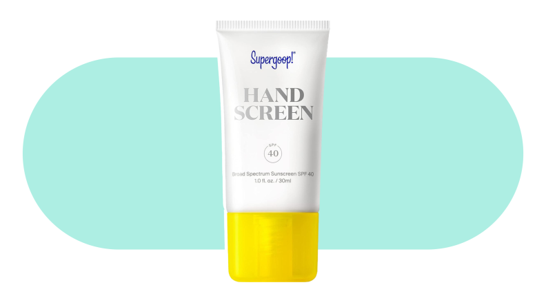 A tube of Supergoop Handscreen on a colorful background
