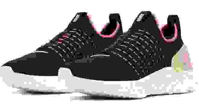 Black Nike sneakers with pink accents
