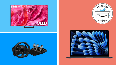 A Samsung S90C QD-OLED TV, Logitech G923 racing wheel, and Apple MacBook Air M3 on a light blue, dark blue, and orange background with the Reviewed Prime Day badge.