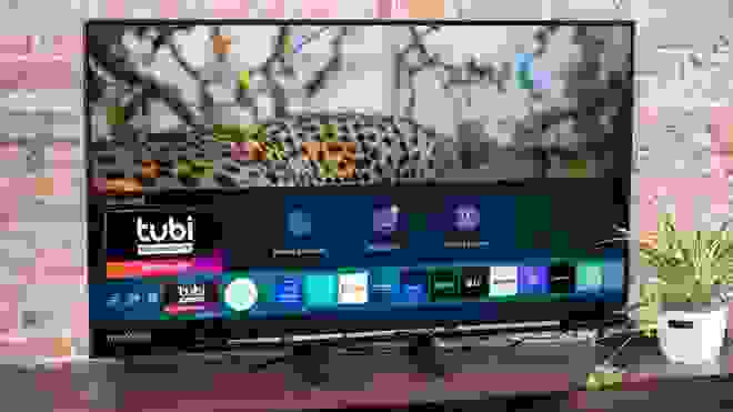 Samsung smart television with cheetah on screen.