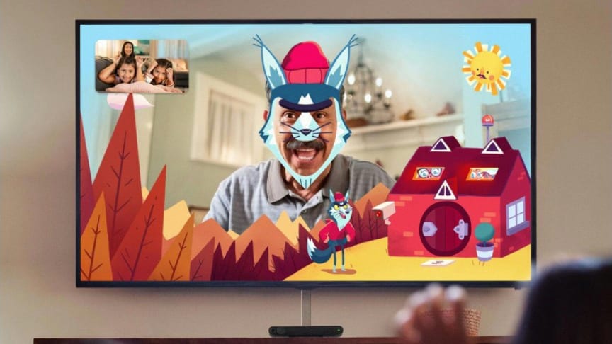 Portal TV showing adult chatting with family using the Three Little Pigs filter