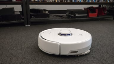 The Narwal Freo cleaning carpet