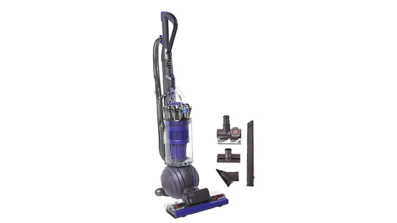 Vacuum with attachments on white background