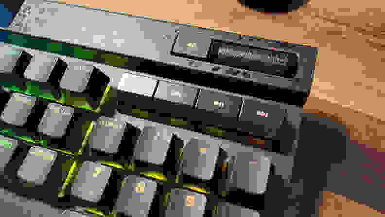 A close up of the media keys on a Corsair K70 Max RGB keyboard, including volume roller.