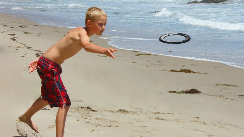 boy throwing disc