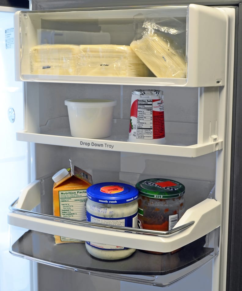 The GE Cafe CFE28TSHSS's drop down tray is great if you plan to store a lot of shorter items on the door.