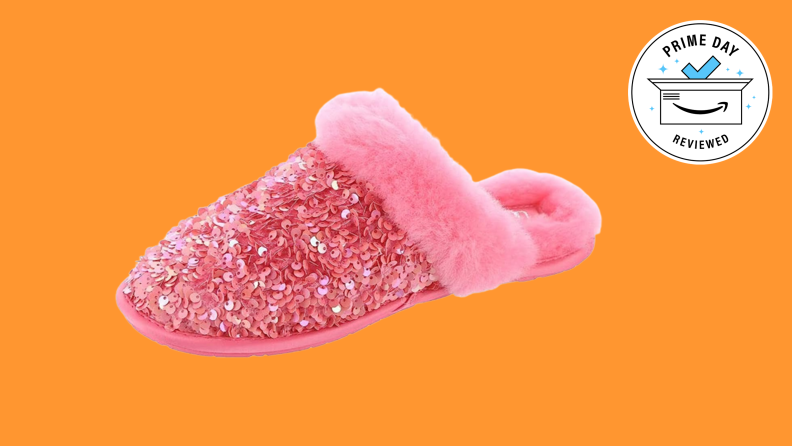 Pink fluffy slippers that are covered in sequins.