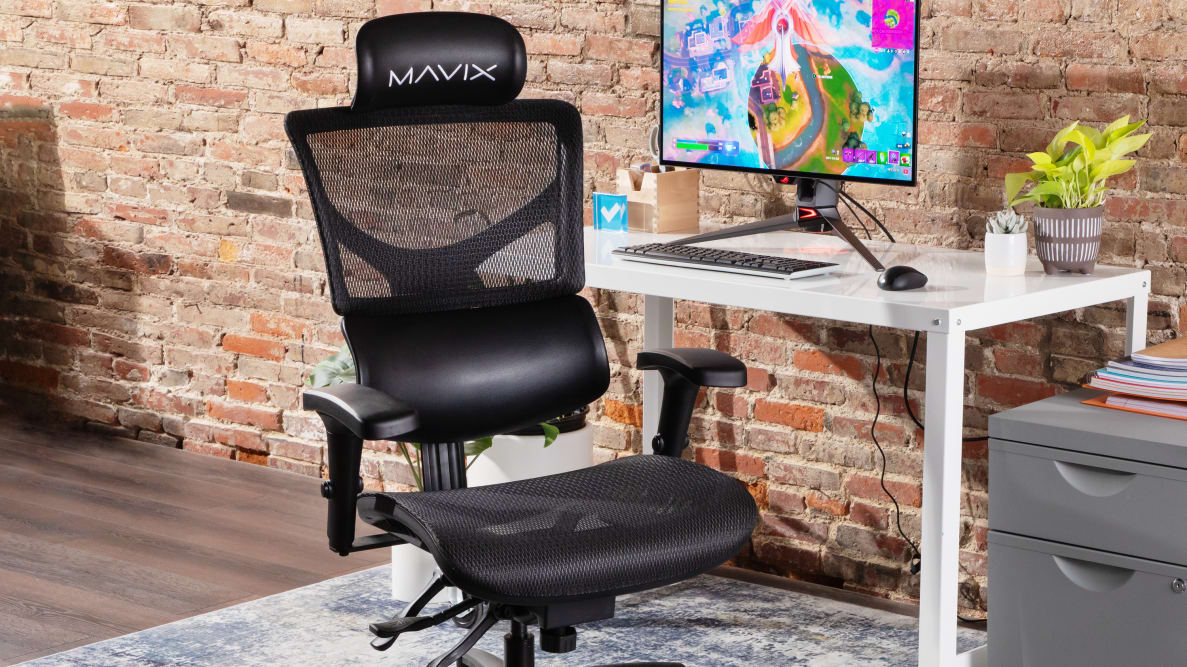 The Mavix M7 in front of a gaming setup.