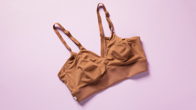 tan bra on pink background