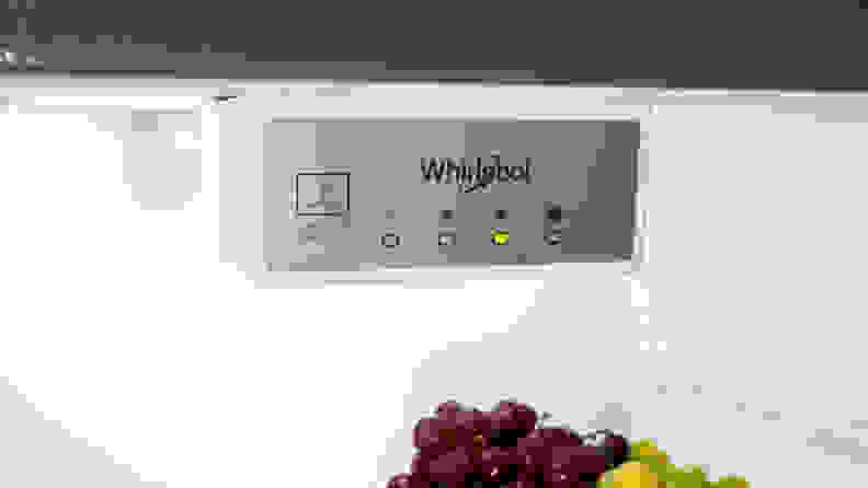 A close-up of the Whirlpool WRT518SZFM top-freezer fridge's temperature controls.