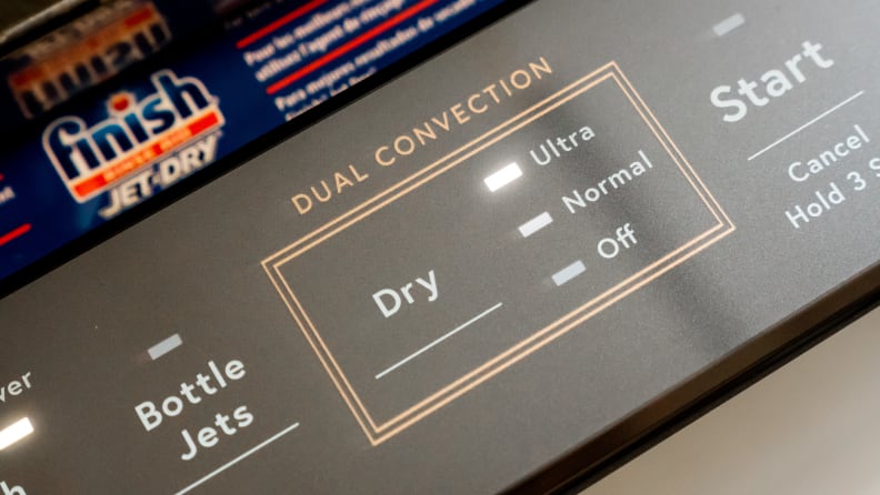 A close-up of a dishwasher's control panel, with the central element being the Dual Convection feature that allows you to select from three levels of dryness.