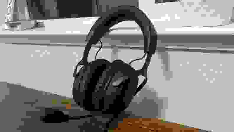 A black gaming headset on a tabletop