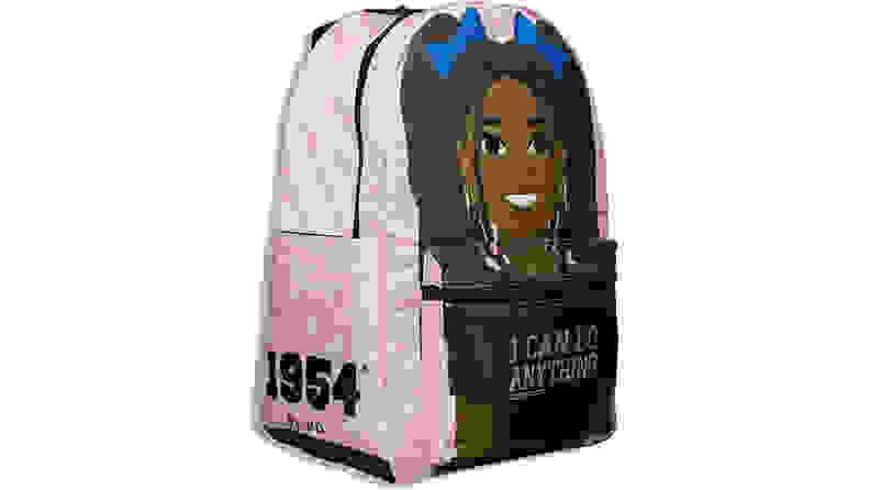 A pink backpack with an illustration of a young Black girl on the front and the words 