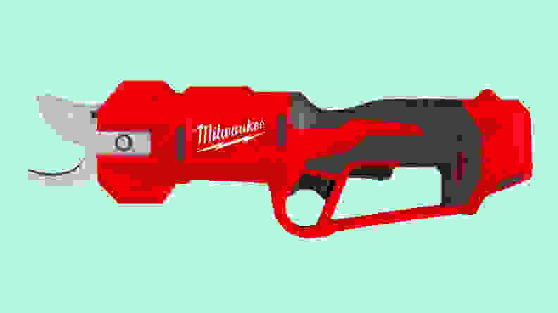 A close-up of the Milwaukee hedge trimmer on a light green background.