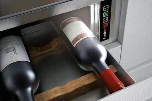 The drawer, which is made entirely of recyclable materials, can hold up to five bottles at once.