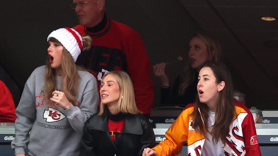 Taylor Swift wearing a Kansas City Chiefs beanie at a football game