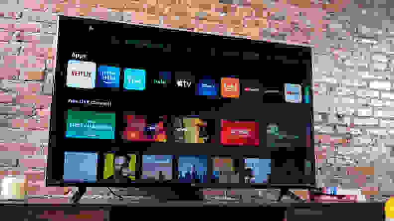 The 2021/2022 Vizio V-Series displaying its smart platform home screen in a living room setting