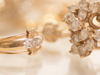 Two diamond rings in golden lighting