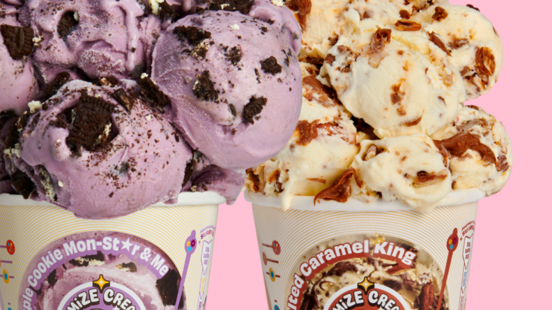 Two ice cream containers stacked with scoops of purple cookie-dough and caramel ice creams.
