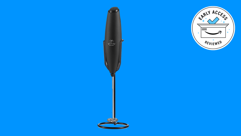 Milk frother on blue background