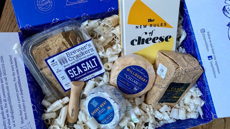November's cheese club box included three cheeses, a book, a handy pocket knife, and my favorite crackers.