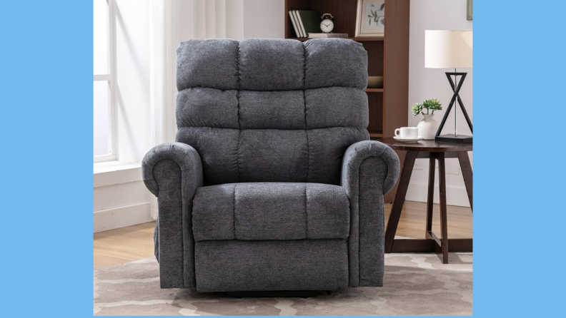 A gray Anj recliner chair on a blue background