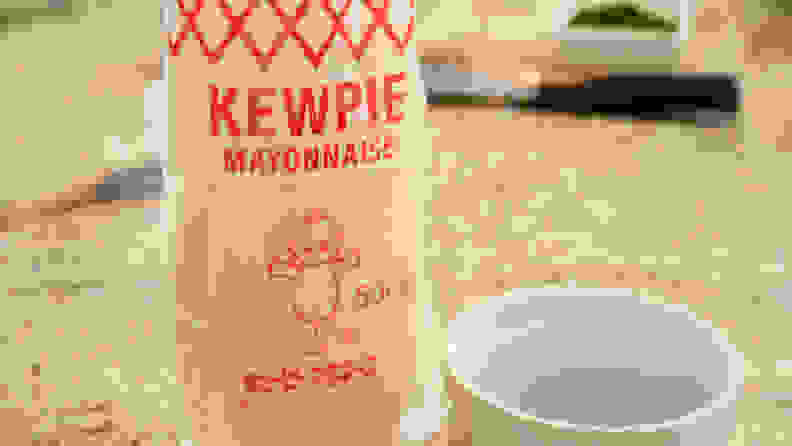 In the center of the image, there's a bag of Japanese kewpie mayo, a main ingredient in the lobster roll recipe.