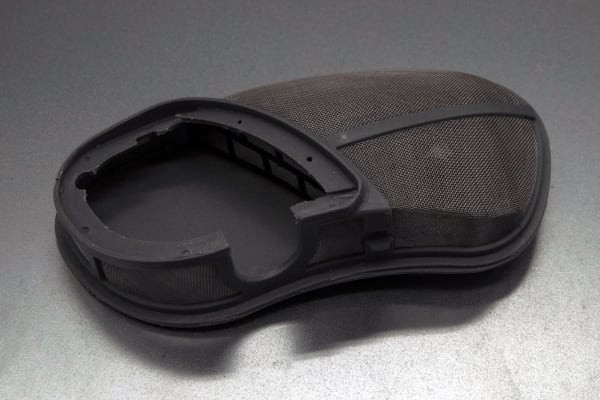 The filter is removable, but difficult to clean.