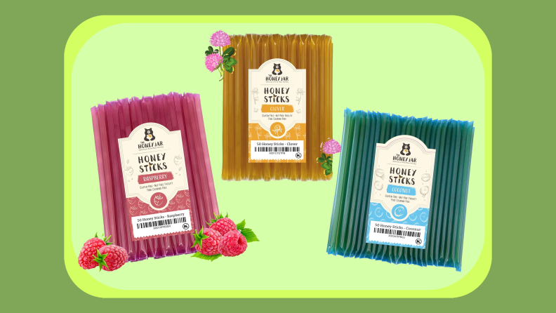 Three packages of Raw Honey Sticks in strawberry, clover, and coconut flavors.