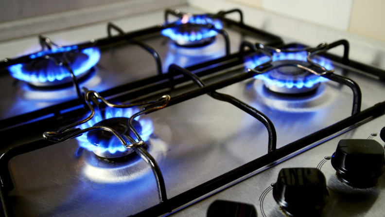 Gas stove with blue flames