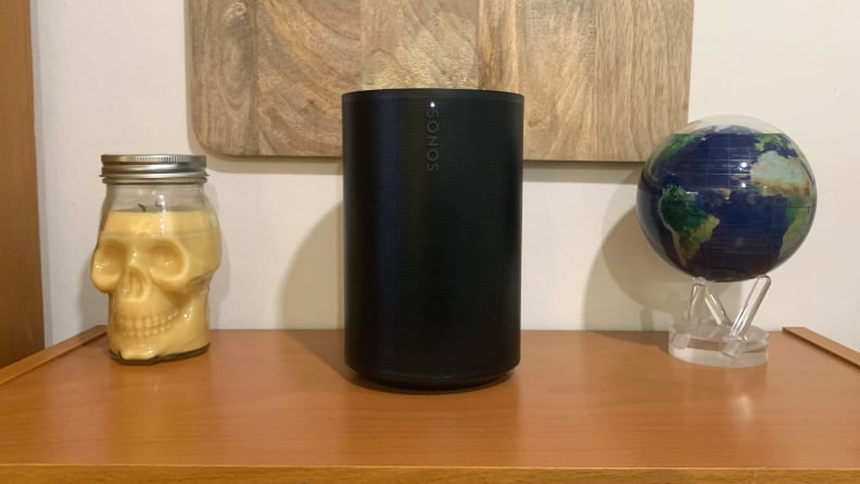 The black Sonos Era 100 on a table.