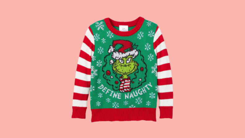 A child-sized ugly Christmas sweater with a pattern featuring The Grinch.
