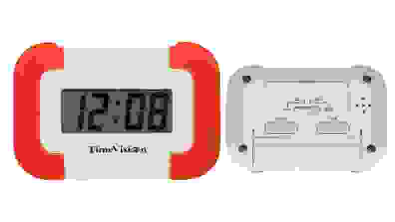 A product image of the ShakeAwake Vibrating Alarm Clock, showing the front and back of the device